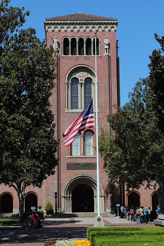 The American flag flies at half staff in front of USC's Bovard Auditorium. (Photo by Vicki Chen)