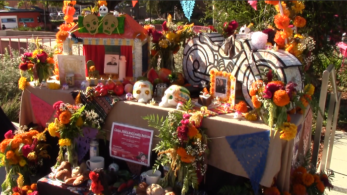 A Día de los Muertos altar, celebrating the lives of lost family members.  