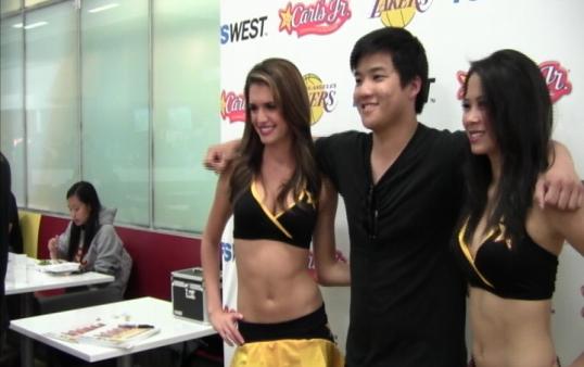 Lakers Girls give away signed pictures for their tour (Photo courtesy of ATVN)