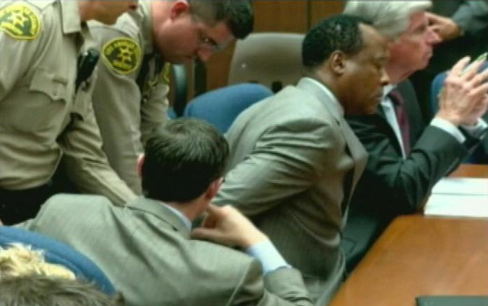 Conrad Murray is handcuffed after he was found guilty of involuntary manslaughter on Monday.