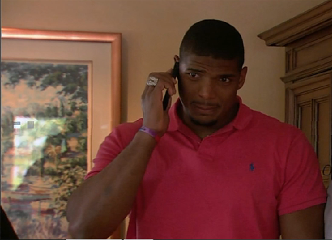 Michael Sam reacts to hearing the news that he has officially been drafted by the St. Louis Rams.