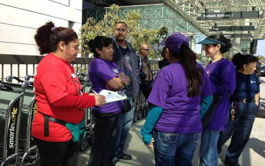 Union members gather at LAX on Thursday to protest airport conditions. (Photo by ATVN)