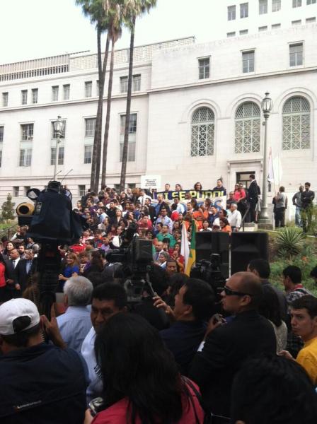 A crowd gathers Thursday outside L.A. City Hall where Gov. Browned signed off on the bill. (Madison Sanders / ATVN)