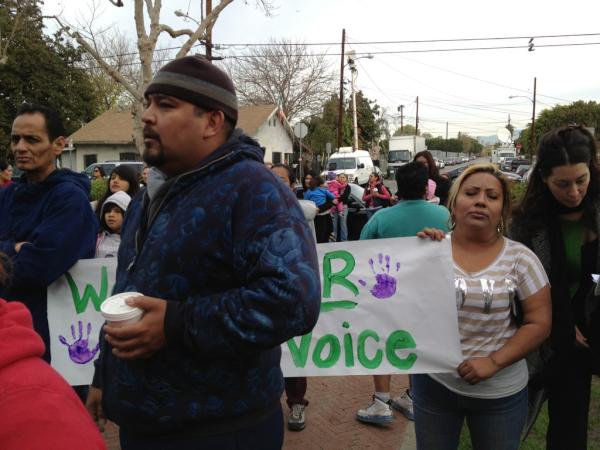 Parents protest outside Miramonte Elementary on Monday. (Photo courtesy ATVN)
