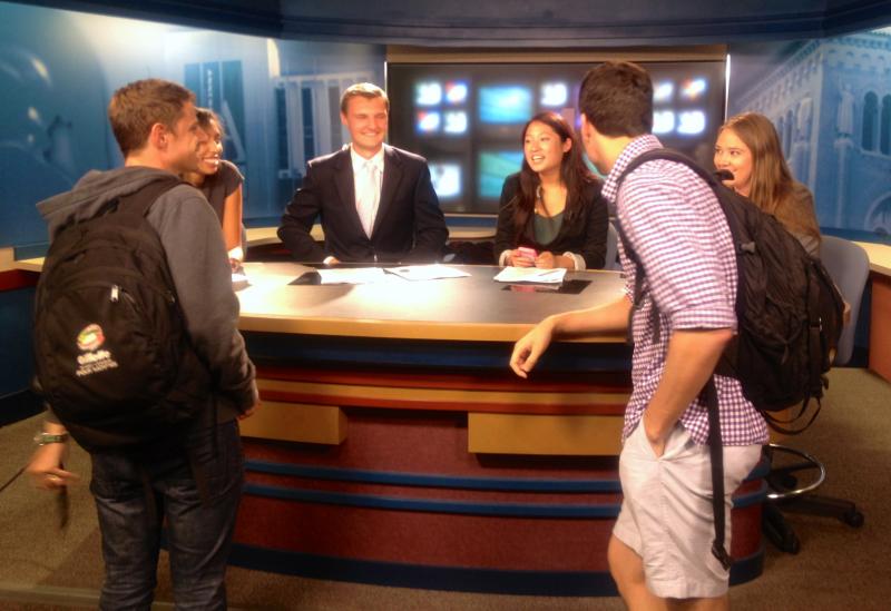 Producers Aaron and Jake talking to the anchors after their show. 