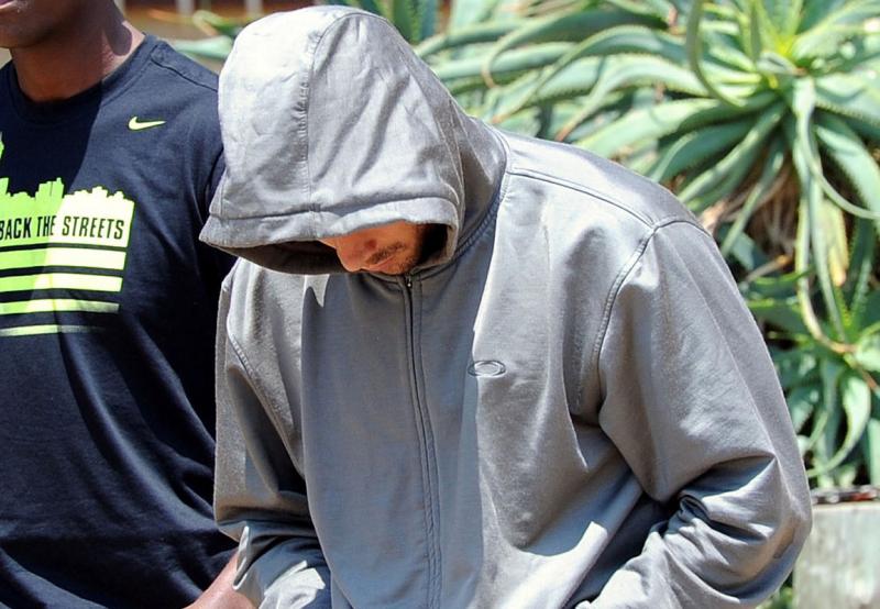 Oscar Pistorius leaving his home on Feb. 14 (AP)