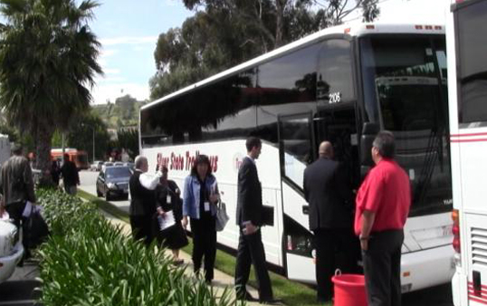 L.A. residents board one of Operation HOPE's buses (Photo by ATVN)