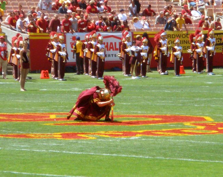 USC's drum major stabs the ground to mark its territory before a football game. (Photo by Sarah Sax)