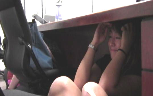 A USC student ducks and covers. (Photo by ATVN) A USC student ducks and covers. (Photo by ATVN)