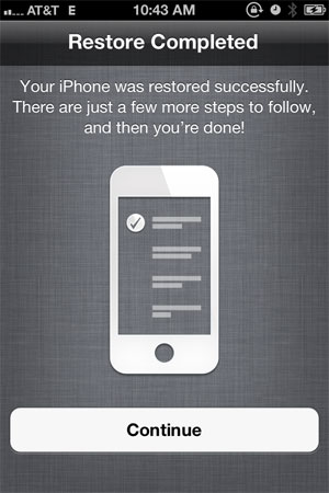Users download iOS 5 on iPHones. (Robbie Heeger)