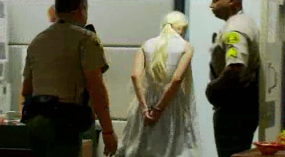Lindsay Lohan escorted from the courtroom in handcuffs. 