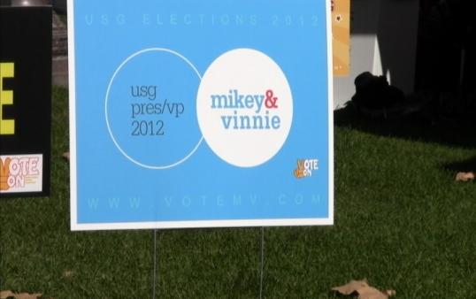 Mikey and Vinnie posters appear throughout campus