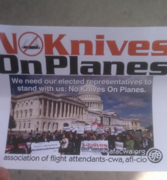 Flight attendants pass out leaflets against small knives on planes. (ATVN/Jake O'Brien)