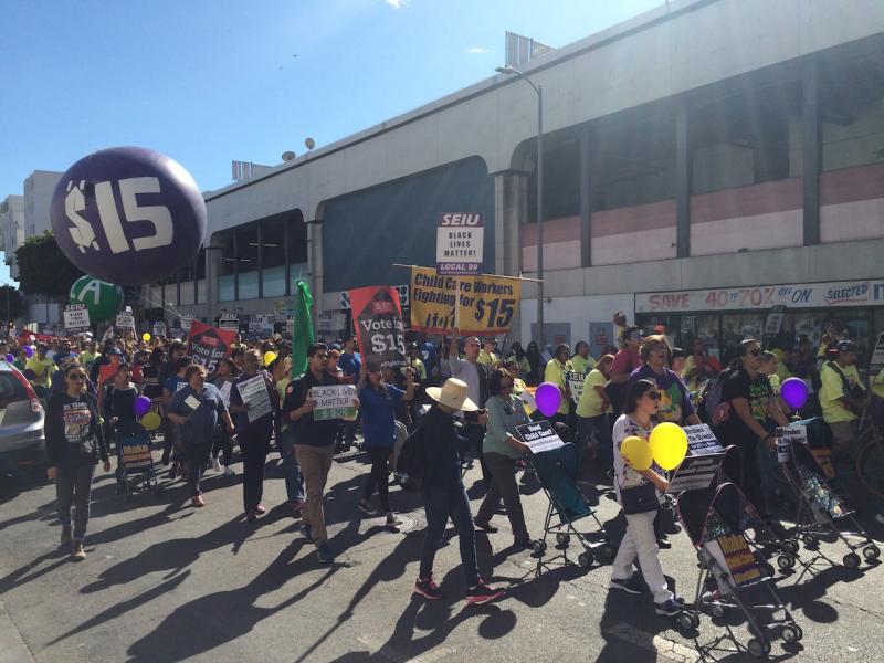 Protesters march for higher minimum-wage rates. (Scott Cook / Annenberg Media)