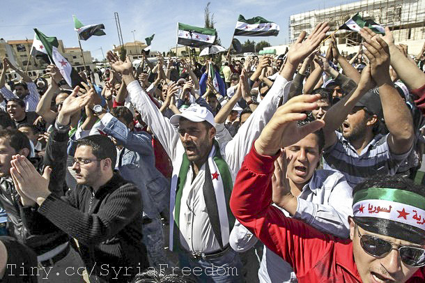 Syrian refugees take part in a demonstration against Assad in April 2012. (Freedom House)